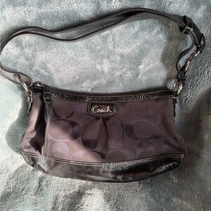 Coach Black Shoulder Bag with Adjustable Strap and Pleated Design